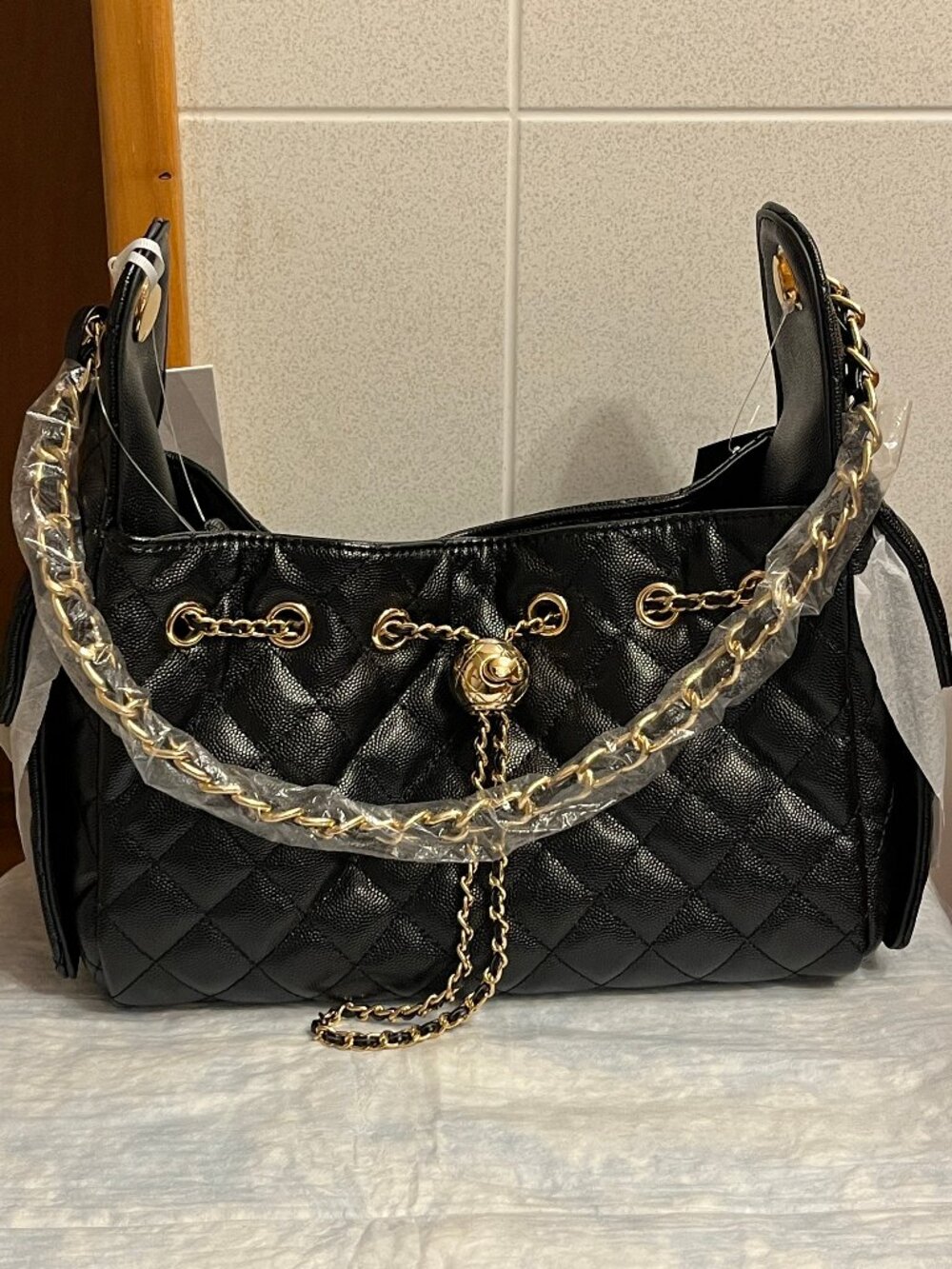 ELLO Alyssa "cc" Quilted Black drawstring Shoulder Bag with Gold Chain Detail
